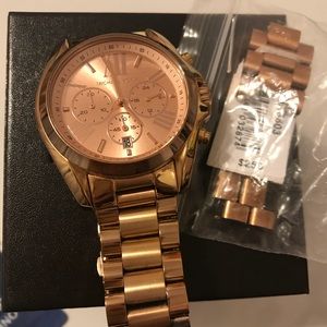 Michael Kors rose gold watch.